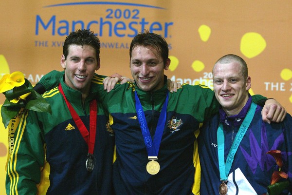 Australia's Ian Thorpe (c) Smiles With Team Mate A